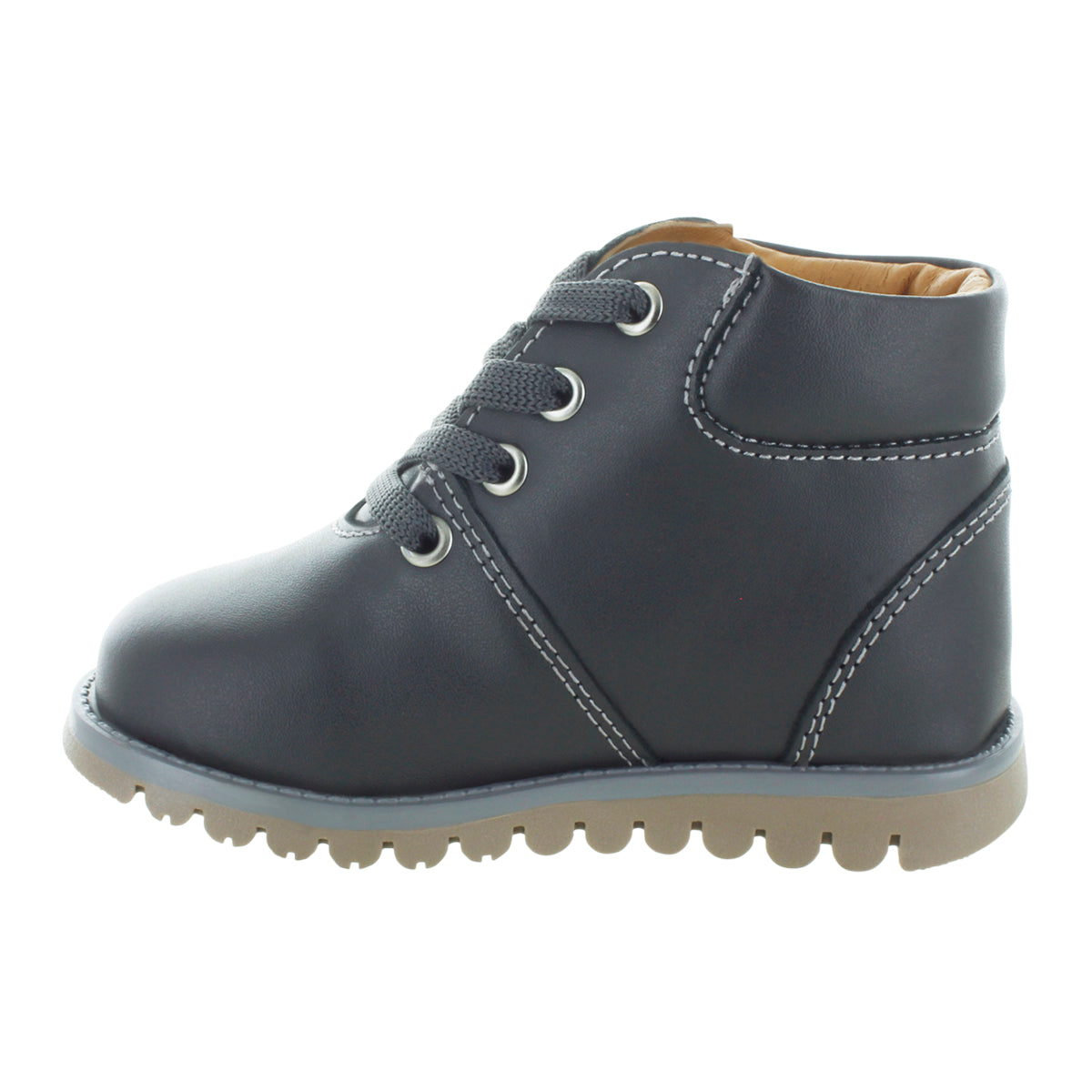 Media bota de piel para niña con detalle metálico en el tobillo mini burbujas vista lateral.