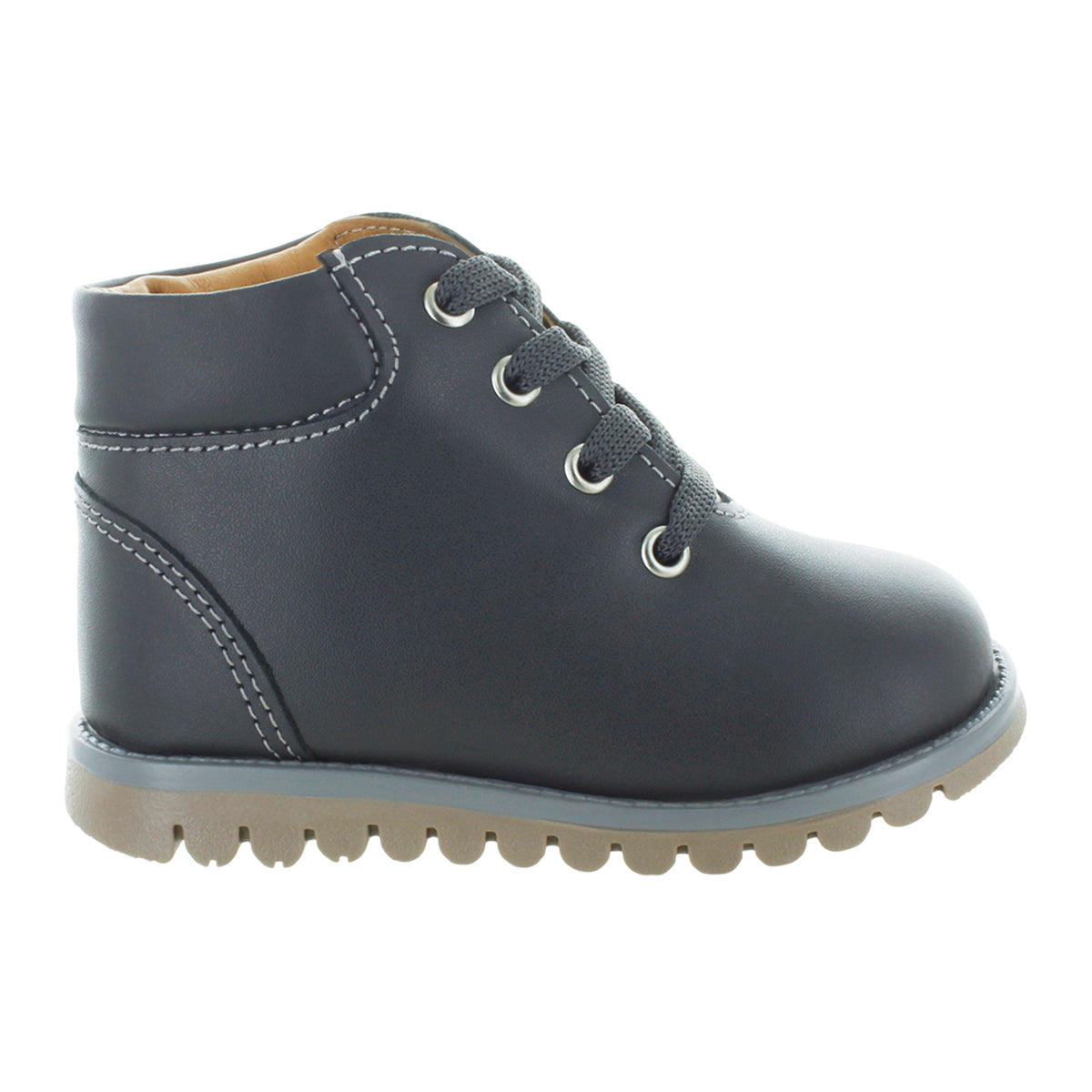 Media bota de piel para niña con detalle metálico en el tobillo mini burbujas vista lateral.